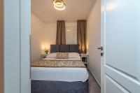 Posteľ alebo postele v izbe v ubytovaní Apartments Liam