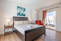 Postel nebo postele na pokoji v ubytování Villa Paraiso Cala dor