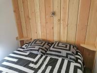 Łóżko lub łóżka w pokoju w obiekcie Le Moulin de la Fortie, Gîtes