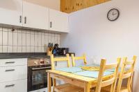 Kuchyň nebo kuchyňský kout v ubytování ALTEA Art apartments