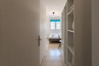 a hallway with a bedroom and a bed in a room at L41 Suite Paladium parking 8pax 4rooms balcony WIFI&#47;AC in Nice