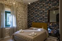 Posteľ alebo postele v izbe v ubytovaní Agriturismo Baglio Làuria