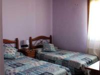 Posteľ alebo postele v izbe v ubytovaní HOSTAL LA SAVINA