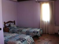 Posteľ alebo postele v izbe v ubytovaní HOSTAL LA SAVINA