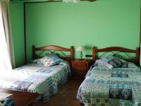 Posteľ alebo postele v izbe v ubytovaní HOSTAL LA SAVINA