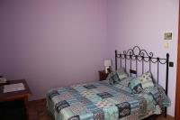Posteľ alebo postele v izbe v ubytovaní HOSTAL LA SAVINA