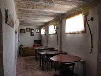 Televízia a/alebo spoločenská miestnosť v ubytovaní HOSTAL LA SAVINA