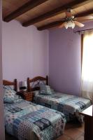 Posteľ alebo postele v izbe v ubytovaní HOSTAL LA SAVINA