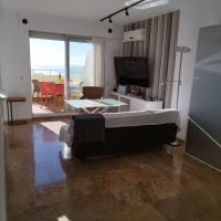 Posteľ alebo postele v izbe v ubytovaní Atico Apartamento Loft Playa Victoria Cadiz