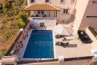 an aerial view of a swimming pool in a villa at Jasmine loft luxury 1 in Kokkini Khanion