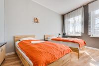 Łóżko lub łóżka w pokoju w obiekcie Hotel Sowa
