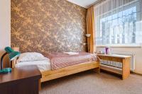 Łóżko lub łóżka w pokoju w obiekcie Hotel Sowa