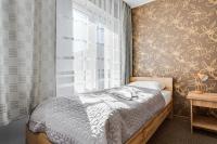 Łóżko lub łóżka w pokoju w obiekcie Hotel Sowa