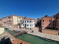 a view of a canal in a city with buildings at Ai Mori d&#39;Oriente in Venice