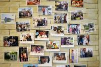a wall filled with pictures of people at Yunju House in Jiaoxi