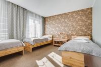 Łóżko lub łóżka w pokoju w obiekcie Hotel Sowa