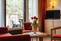 Telewizja i/lub zestaw kina domowego w obiekcie Hotel Garni Alpenruh-Micheluzzi