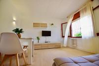 Televízia a/alebo spoločenská miestnosť v ubytovaní V&V LLORET- Apartamento Europa