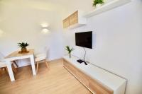 Televízia a/alebo spoločenská miestnosť v ubytovaní V&V LLORET- Apartamento Europa
