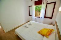 Posteľ alebo postele v izbe v ubytovaní V&V LLORET- Apartamento Europa