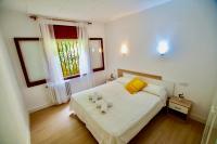 Posteľ alebo postele v izbe v ubytovaní V&V LLORET- Apartamento Europa