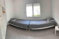 Posteľ alebo postele v izbe v ubytovaní Maison quetigny