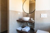 a bathroom with a sink and a mirror at Château de Pierreclos in Pierreclos