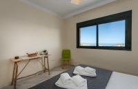 A bed or beds in a room at Colinas el Hacho 2320 Sea view