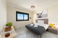 A bed or beds in a room at Colinas el Hacho 2320 Sea view