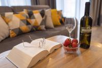 Nápoje v ubytovaní Apartamenty KAPRYS - Centrum