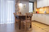 Kuchyňa alebo kuchynka v ubytovaní Apartamenty KAPRYS - Centrum