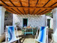 A seating area at Le Pajare di Marina Serra di Casa Camilla Journey