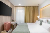 Ein Bett oder Betten in einem Zimmer der Unterkunft www VillaGoldenHill com