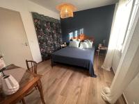 Posteľ alebo postele v izbe v ubytovaní Maison rénovée 3 chambres près plage, clim, internet - FR-1-726-5