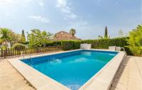 The swimming pool at or close to Gorgeous Home In Alhaurin De La Torre