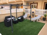 A patio or other outdoor area at Magnificent Apartment Mar de Cristal, Pl Baja, Urb private, leisure and swim n01