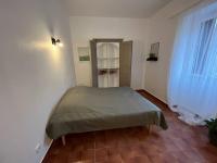 Posteľ alebo postele v izbe v ubytovaní T3 au coeur de la vieille ville de Porto-Vecchio