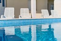 Bazén v ubytování M&M Holiday House with a Pool nebo v jeho okolí