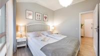 Posteľ alebo postele v izbe v ubytovaní Apartamenty Sun & Snow Rezydencja Park