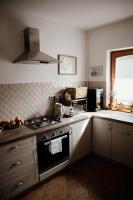 A kitchen or kitchenette at Sipos Borház és Vendégház