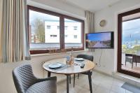 TV a/nebo společenská místnost v ubytování Strandburg Strandburg Appartement 1