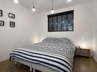 A bed or beds in a room at Maison Saint-Pierre-d&#39;Ol&eacute;ron, 4 pi&egrave;ces, 6 personnes - FR-1-246A-215