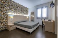 Posteľ alebo postele v izbe v ubytovaní Alaba Hotel