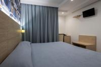 Posteľ alebo postele v izbe v ubytovaní Alaba Hotel