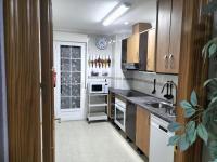 A kitchen or kitchenette at Magnificent Apartment Mar de Cristal, Pl Baja, Urb private, leisure and swim n01