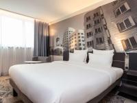 Novotel Duesseldorf Airportにあるベッド