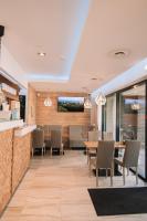 Posezení v ubytování Merepargi ApartHotel & Cafe