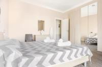 A bed or beds in a room at Poste Rooms 28
