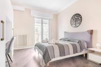 A bed or beds in a room at Poste Rooms 28