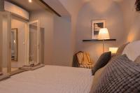 Posteľ alebo postele v izbe v ubytovaní Heraclea Residential Apartments